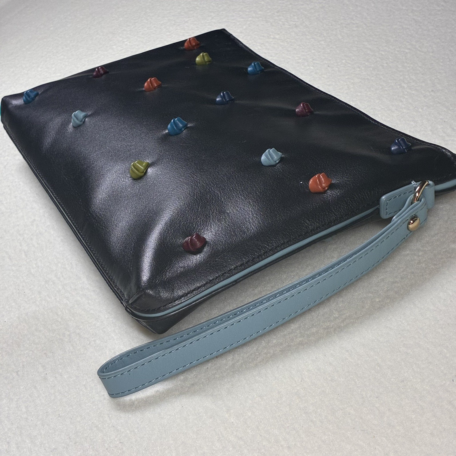 Tehra & B Black Leather Wristlet Clutch Hand-tied Signature Knots Blue Trim