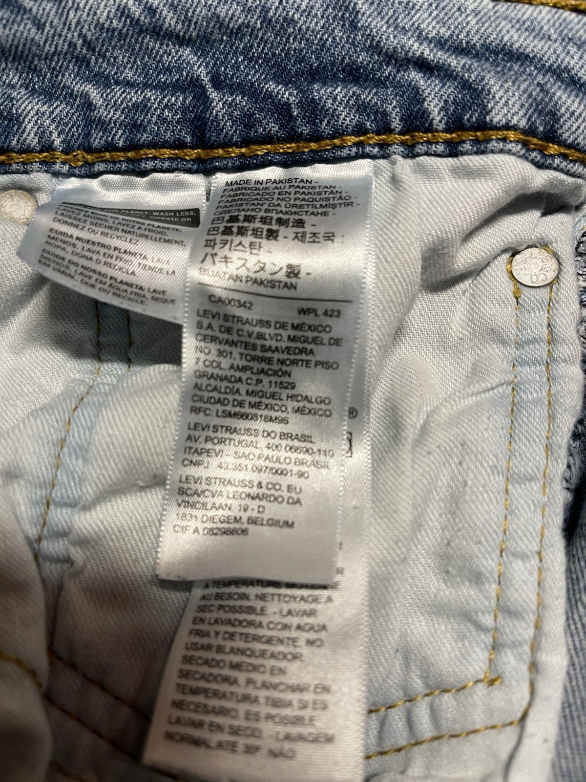 Levi Strauss & Co Men’s Blue Slim Straight Light Wash Distressed Denim Jeans
