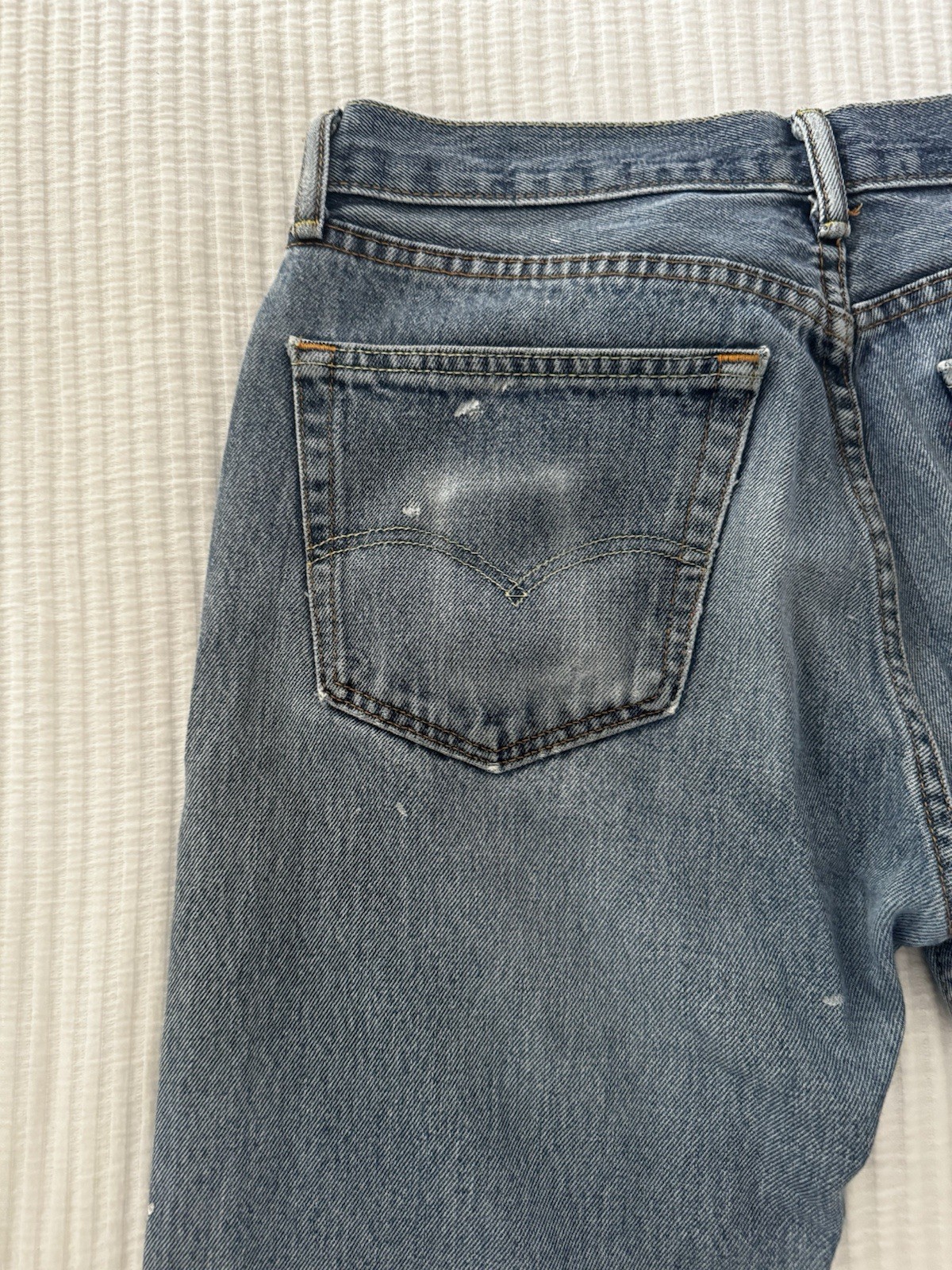 Levi’s 505 thrashed painted and ripped blue jeans 32 X 29