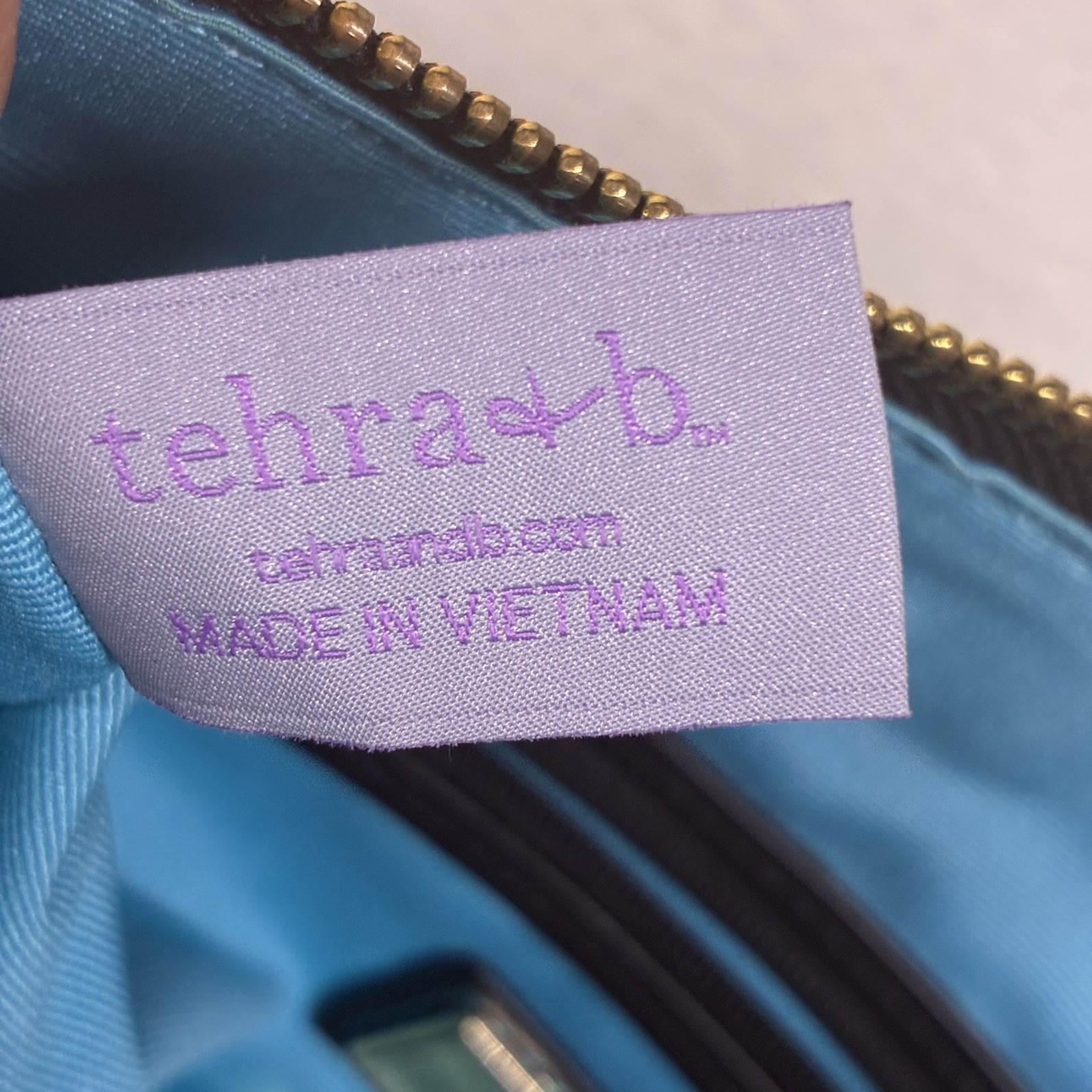 Tehra & B Black Leather Wristlet Clutch Hand-tied Signature Knots Blue Trim