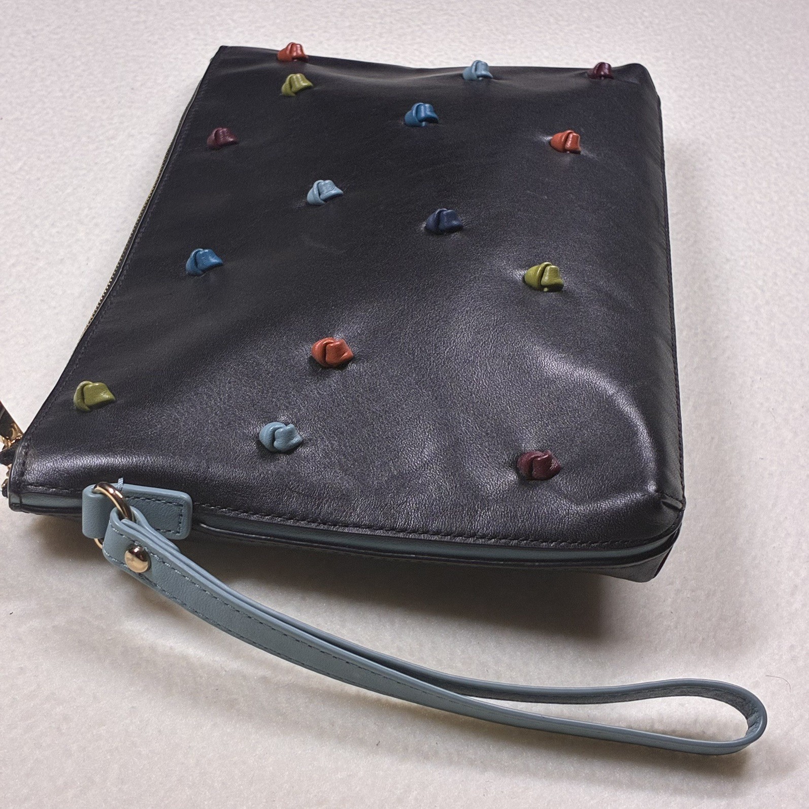 Tehra & B Black Leather Wristlet Clutch Hand-tied Signature Knots Blue Trim