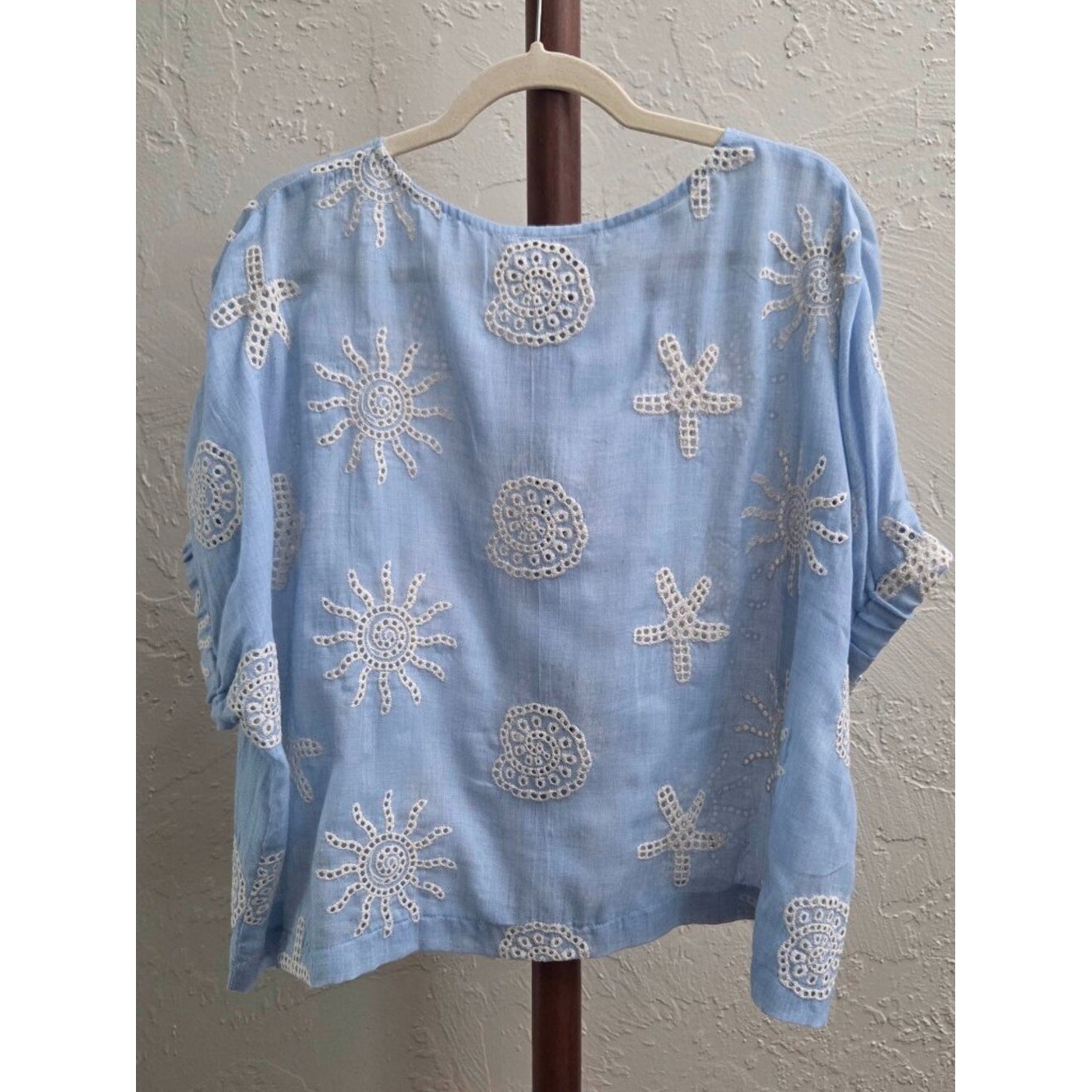 T33. Coastal Embroidered Eyelet Blue Top