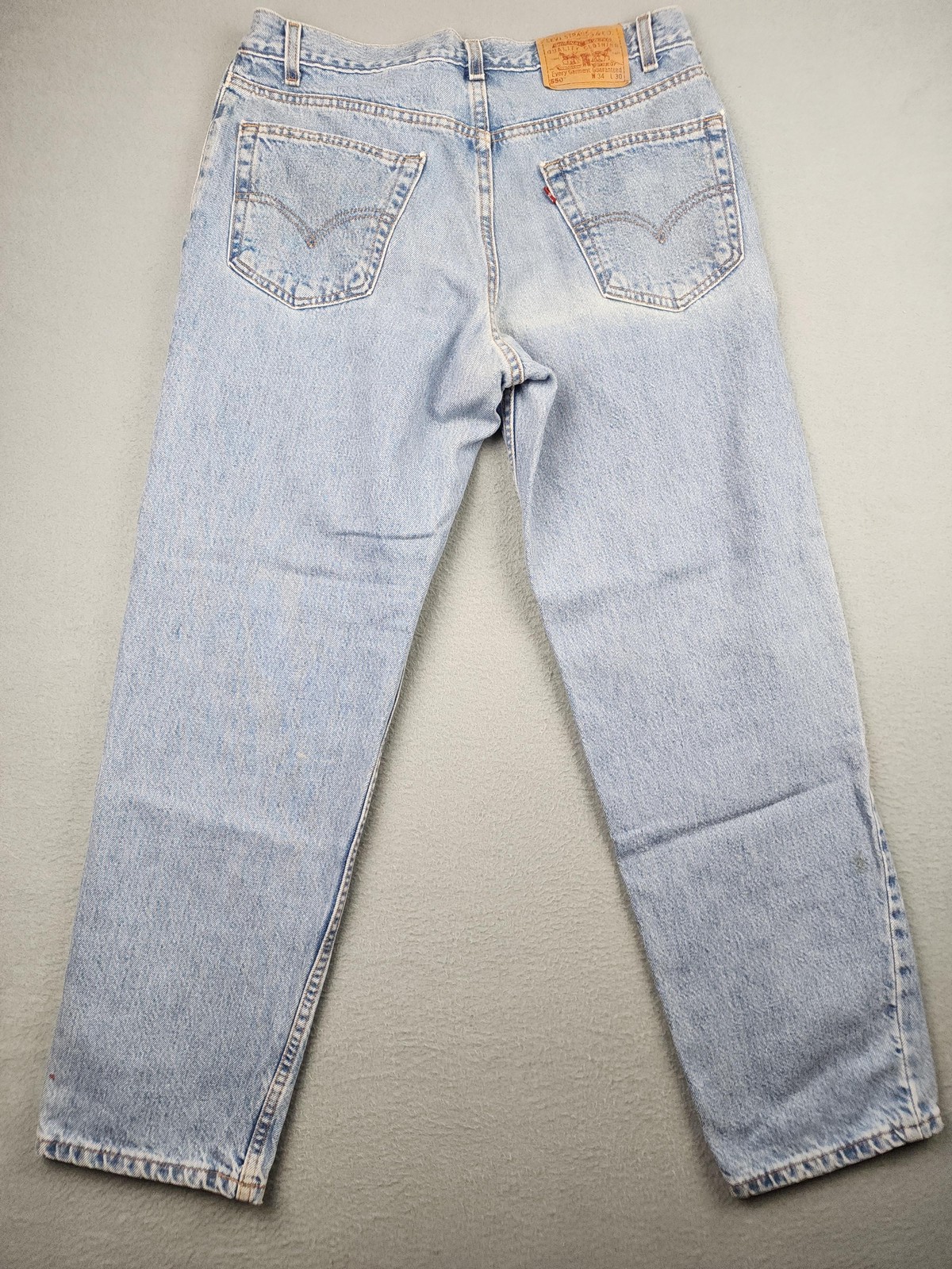 Vintage Levi’s 550 Relaxed Taper Jeans Mens 34×30 (32×29) Light Blue Denim USA