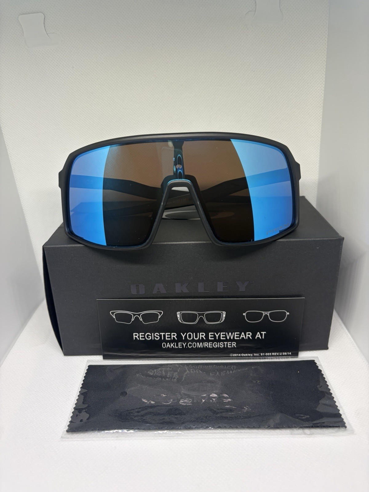 Oakley Sutro Lite Sunglasses, Black Frame W/ Blue Primz Polarized Lenses NEW