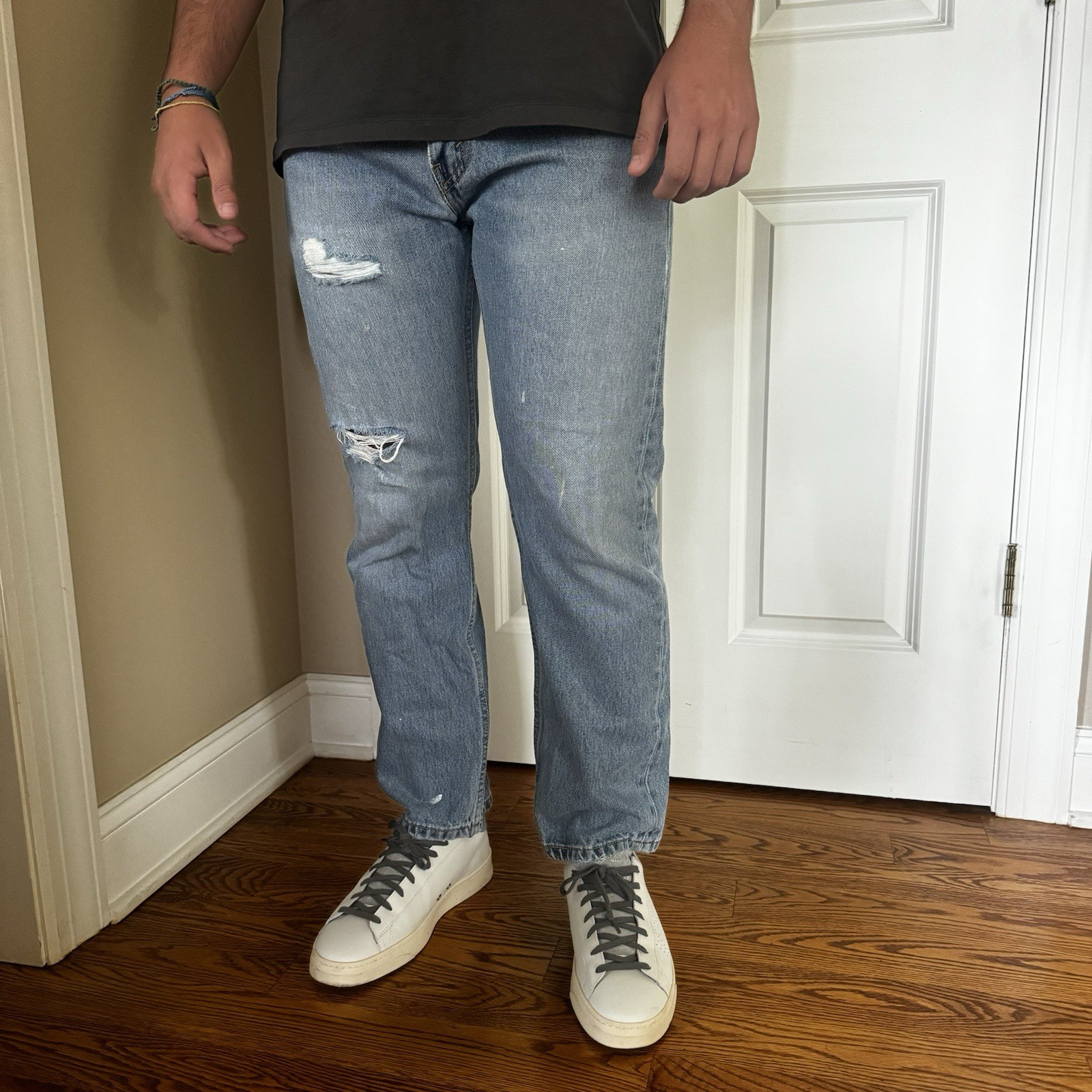 Levi’s 505 thrashed painted and ripped blue jeans 32 X 29