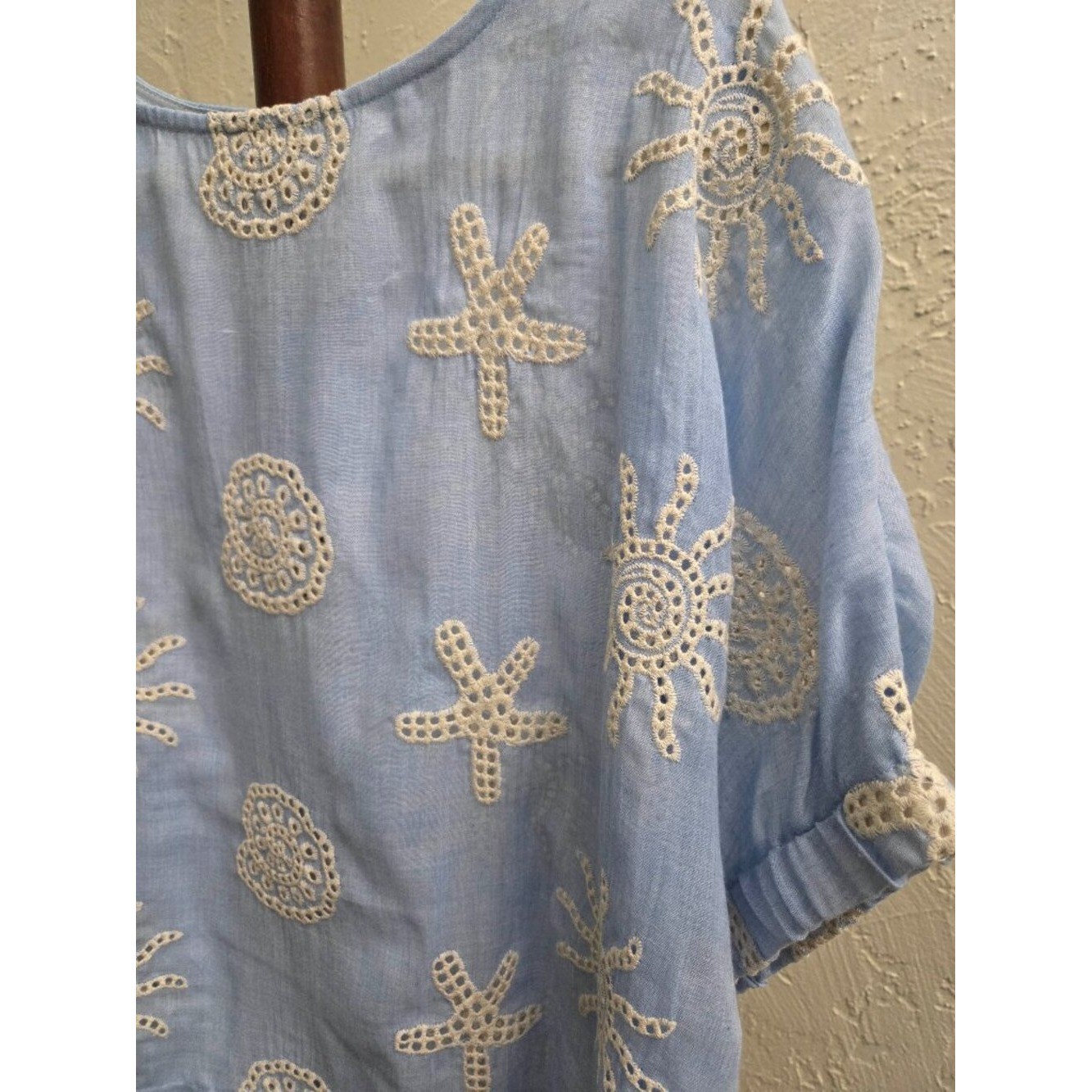 T33. Coastal Embroidered Eyelet Blue Top