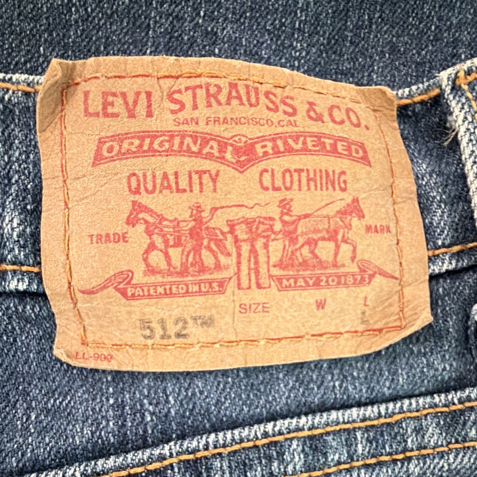 Levi’s Women’s Dark Wash Blue Denim Slim Fit Stretch Tapered Jeans, 5-Pocket