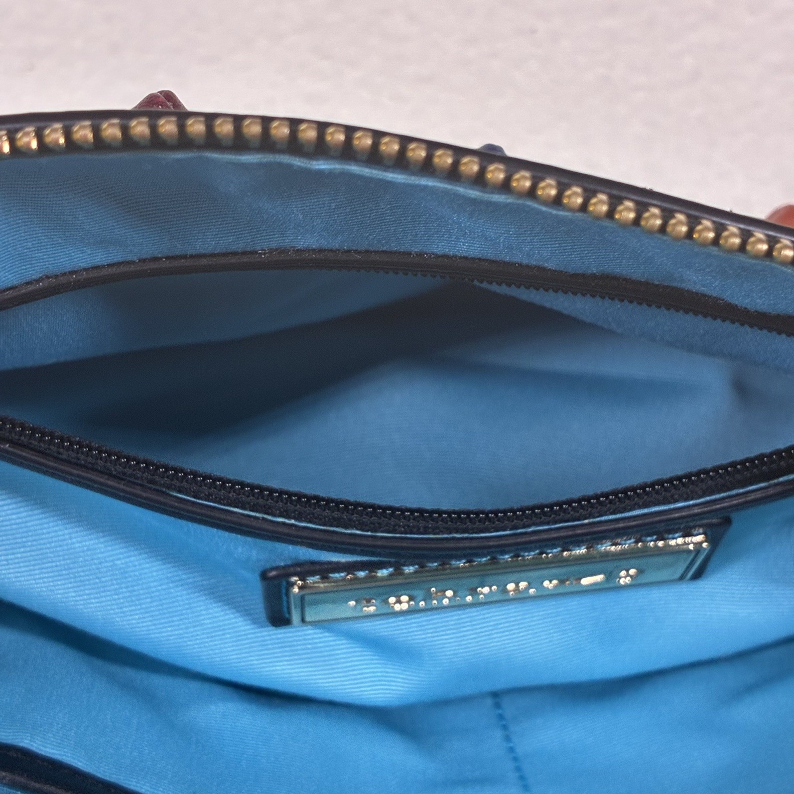 Tehra & B Black Leather Wristlet Clutch Hand-tied Signature Knots Blue Trim