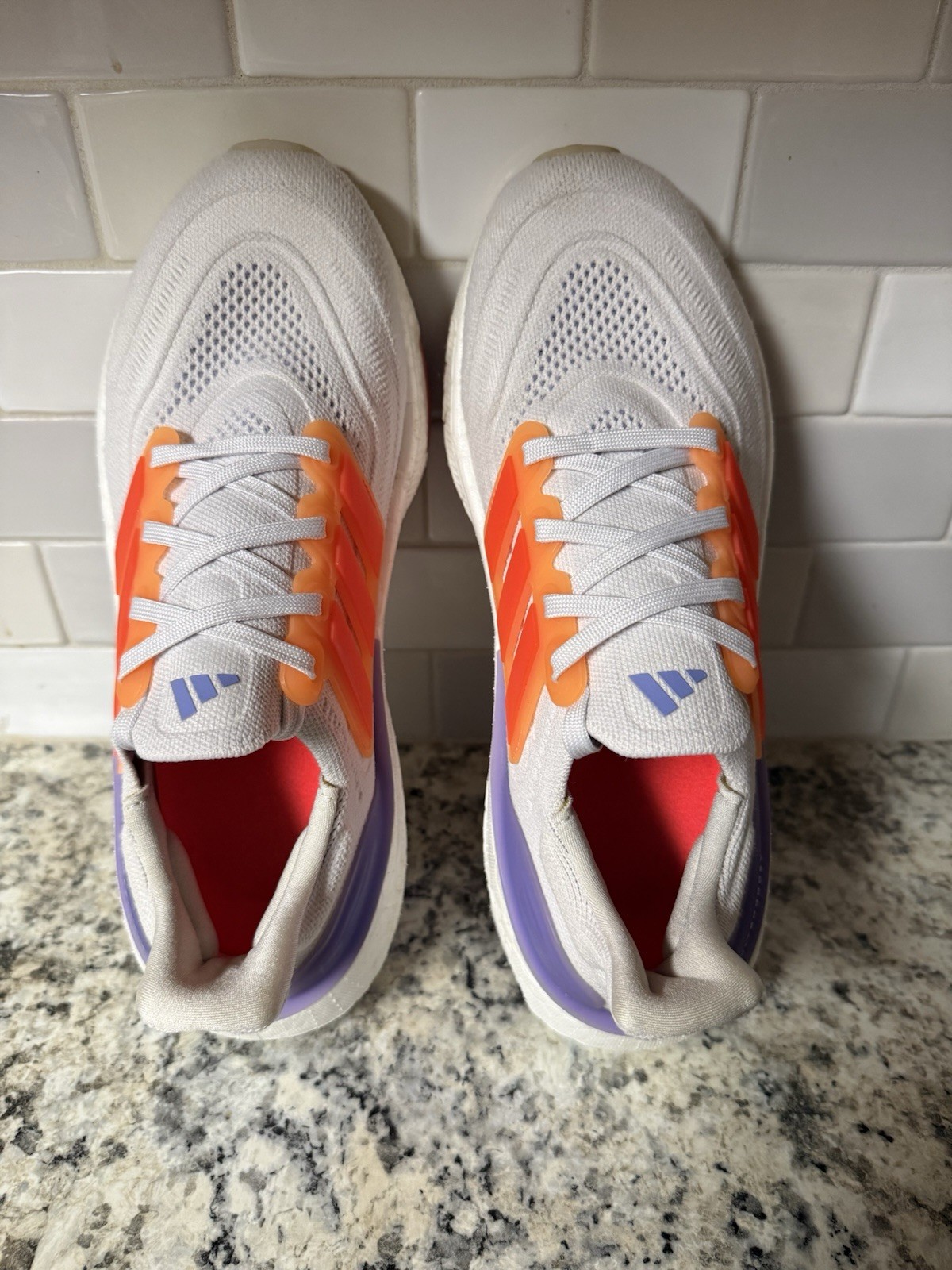 Adidas Ultraboost Light – Cloud White / Solar Red / Beam Pink