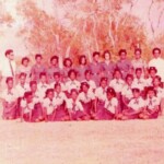 1970s:Vintage photo of Mr. Charlie Pilgrim (extreme left) and Mr. Harry Sealy (extreme right) Pilgrim with the girls of form six, Lois Ince and Marva Lorde (now Marva Lahai).