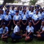 Mrs. Marva Lahai (at extreme right ) stands proudly with members of the Combermere Girl Guides unit. At extreme left if Lorna Nurse-Brathwaite, one of the co-founders of the movement in 1976